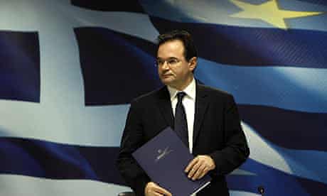 Greece's Finance Minister Papaconstantinou leaves a news conference in Athens