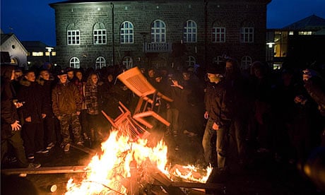 Protesters in Reykjavik burn furniture at a demonstration over the financial crisis