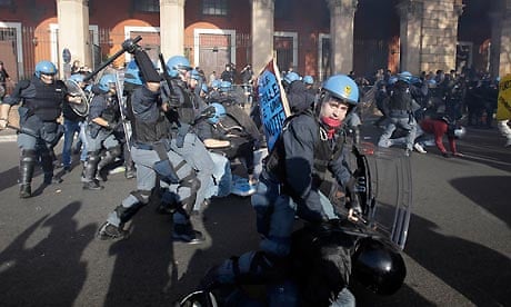 Riot police and protesters clash in Rome