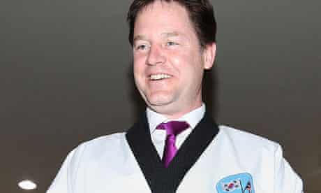Deputy prime minister Nick Clegg wearing a taekwondo uniform in Seoul during a trade mission.