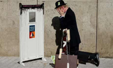 Performance artist Frank O'Dea with his installation piece 'Confessions of a Banker' in Dublin