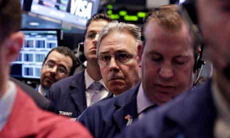 Traders on the floor of the New York Stock Exchange 