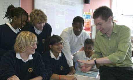 A teacher giving a maths lesson to pupils at the Charter School, Dulwich, south London