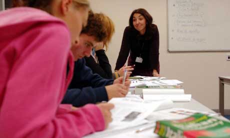 A teacher giving an Italian lesson to students at Canterbury College, Kent