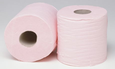 roll pink toilet paper, a roll of pink toilet paper on a white