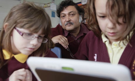 Prof Sugata Mitra, who inspired Slumdog Millionaire with pupils at St Aidan's primary, Gateshead