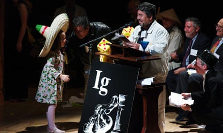 Javier Morales (in white) and Miguel Apátiga at the Ig Nobel ceremony