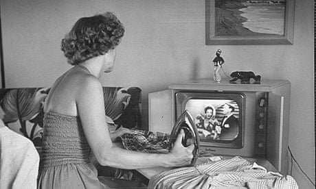 woman watching tv in 50s