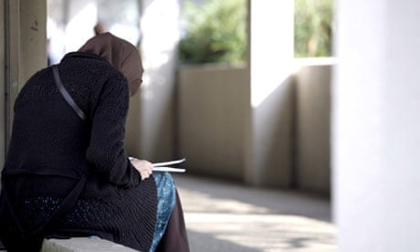 Muslim female student reading