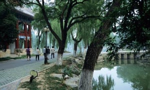 Students stroll on the campus of Peking University