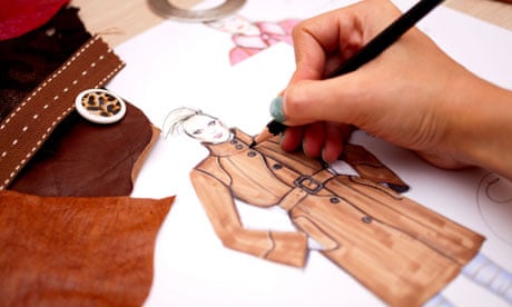 Fashion designer is drawing a fashion sketch for autumn-winter season