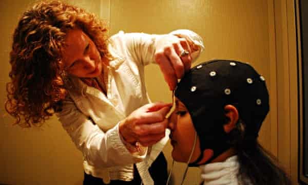 scientist performing brain experiment