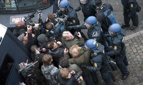COP15 Police clash with journalists and photographersnear the Copenhagen Harbour
