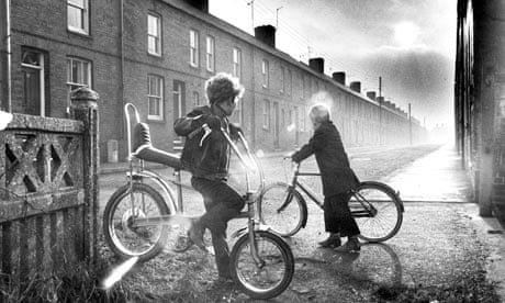 kids riding bikes black and white