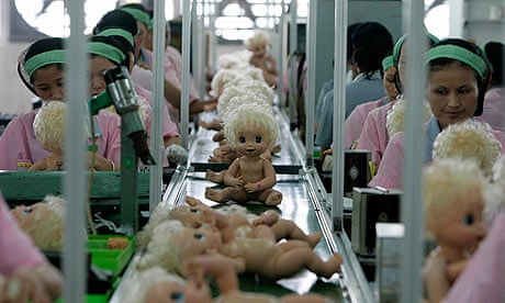 MDG : TUC and rules :Labourers work at the production line at a toy factory in Panyu in China
