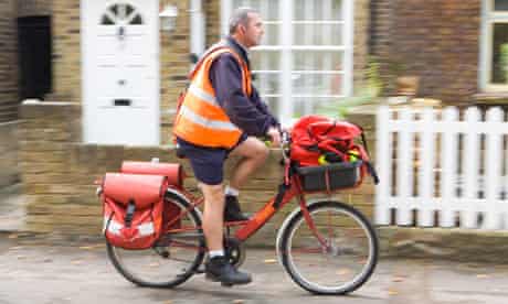 Bike blog: Postman cycling Twickenham, London, Britain - 14 Oct 2009