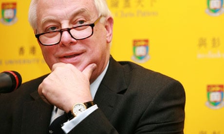 Hong Kong's former governor Chris Patten listens during the interview in Hong Kong