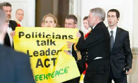 Activists from Greenpeace gatecrash the State Dinner for heads of state during COP15 in Copenhagen