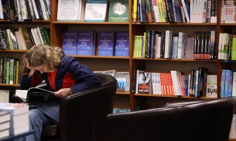 MDG : A student reads a book in a bookshop as Oxford University commences its academic year 