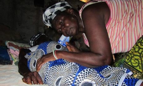 MDG : TBA, traditional birth attendant, Hannah in village of Old Condor Sierra Leone 