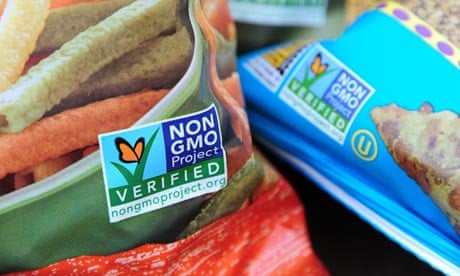 Labels on bags of snack foods indicate they are non-GMO 