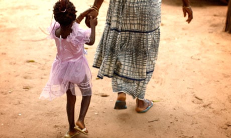 MDG : FGM : A mother and daughter after a meeting to eradicate female genital mutilation in Senegal