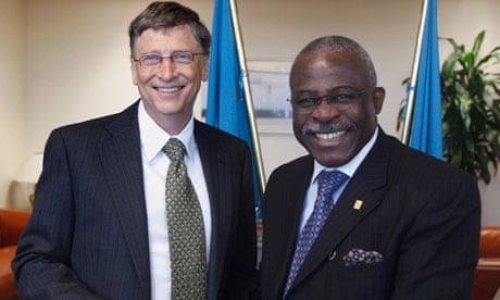 MDG : Bill Gates smiles next to IFAD President Kanayo F. Nwanze