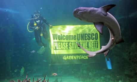 Greenpeace banner urging UNESCO to save the Great Barrier Reef, at the Sydney Aquarium , Australia