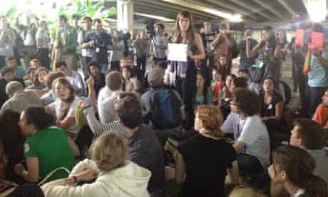 Activist protest at the conference center against the weakness of the UN Rio+20 agreement