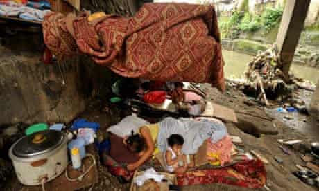 MDG: Shanty home under a bridge in Manila