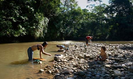 Family by Napo River, Amazon Rain Forest, Ecuador