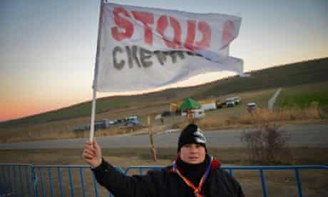 Stop Chevron at a makeshift camp erected by fracking for shale gas protesters in Romania