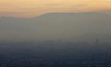 Sooty air pollution : Santiago, Chile, covered by smog