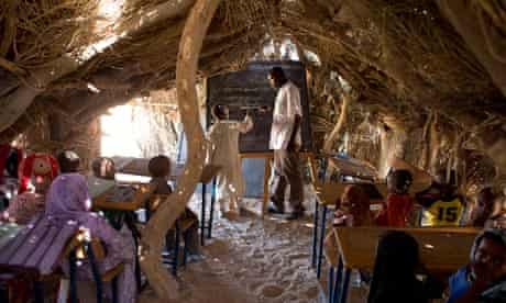 MDG : Primary school : student at the blackboard in Louri village's school hut, Chad