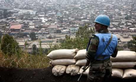 MDG : Goma, DRC :  An Indian UN peacekeeper stands on Mount Goma