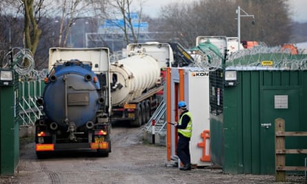 Tankers enter the fortified Barton Moss gas fracking exploration facility