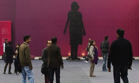 MDG : India Art Fair visitors walk past an installation by Leena Kejriwal