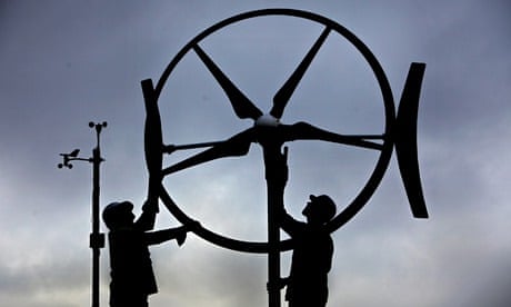 Green energies : Workers at Renewable Devices Swift Turbine, work on a wind turbine unit