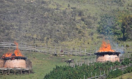 Homes of Sengwer people stand burning in Embobut, Kenya.