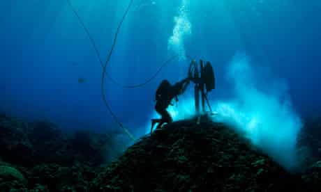 Australian marine scientists examine coral cores at Clerke Reef, Western Australia