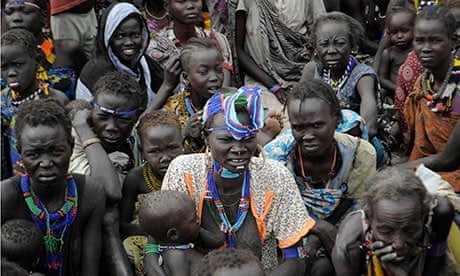 Victims of ethnic violence in Jonglei state, South Sudan, wait at a food distribution centre