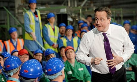British Prime Minister David Cameron (R)