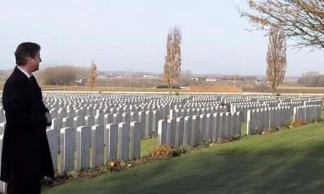 David Cameron at the graves of first world war soldiers in Tyne Cot cemetery in Zonnebeke, Belgium