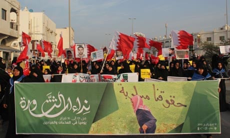 Women march in Bahrain to mark the second anniversary of the uprising