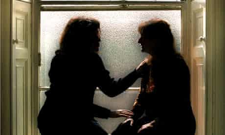 A FEMALE COUNSELLOR COMFORTS A FEMALE PATIENT. Image shot 2001. Exact date unknown.