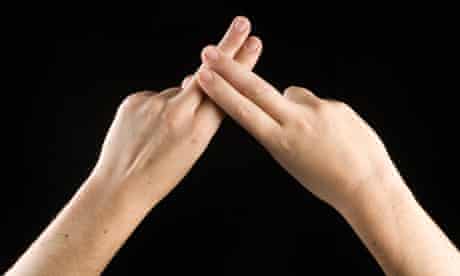 The word ‘deaf’ is spelled in sign language