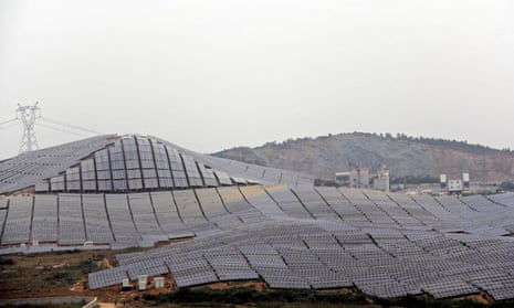 Green energy in China : Solar panels part of 100 Megawatt Solar farm In Wuhu