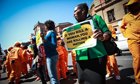 Women’s rights activists outside the high court in Pretoria, South Africa, during the trial of Oscar Pistorius in September 2014.