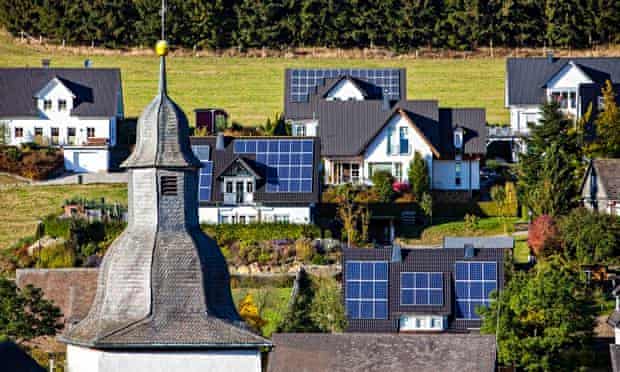 Solar panels on the roofs of residential houses, Oberkirchen, North Rhine-Westphalia, Germany