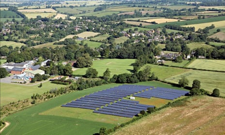 Aerial view of a solar farm - a field of solar panels Sibford Ferris, Oxfordshire UK